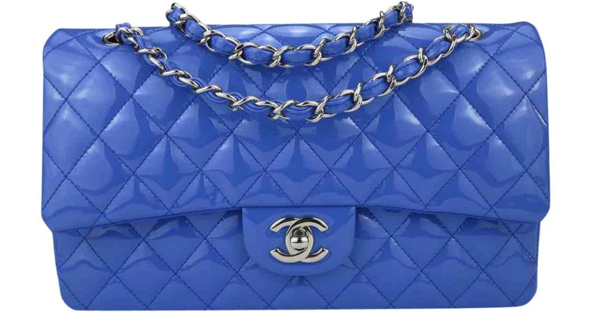 Lyst Chanel Pre Owned Timeless Blue Patent Leather Handbags In