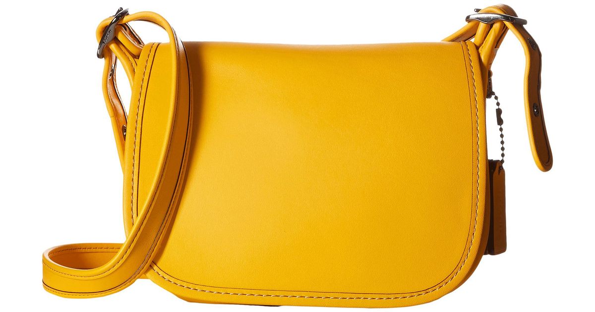 Lyst Coach Glovetanned Leather Saddle Bag 18 In Yellow
