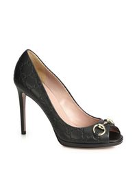 Gucci | Black Gisele Monogram-embossed Leather Peep-toe Pumps | Lyst