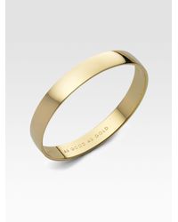 kate spade new york | Metallic As Good As Gold Engraved Idiom Bangle Bracelet | Lyst