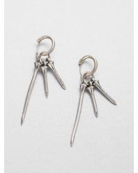 Low Luv by Erin Wasson | Metallic Golf Tee Huggie Earrings | Lyst
