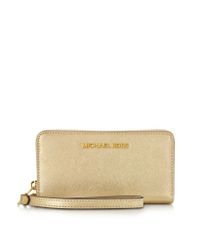 Michael Kors - Pale Gold Metallic Saffiano Leather Jet Set Travel Large Smartphone Wristlet - Lyst