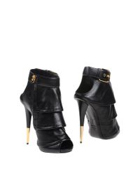 Lyst - Giuseppe Zanotti Tiered Leather Ankle Boots in Black