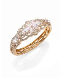 Adriana Orsini | Metallic Embraced Floral Bangle Bracelet | Lyst