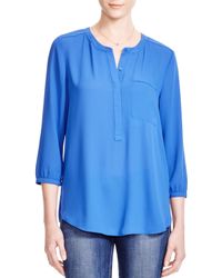 NYDJ | Blue High/low Hem Pleat Blouse | Lyst