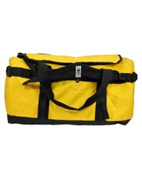 north face yellow duffle bag