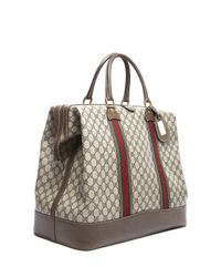 Lyst - Gucci Preowned Beige Gg Canvas Webbed Vintage Large Travel Bag in Natural