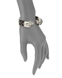 Alexander McQueen | Metallic Studded Leather-Inset Double Skull Cuff Bracelet | Lyst