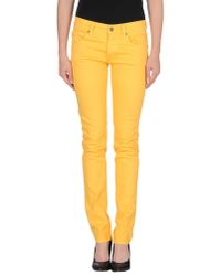 pastel yellow trousers