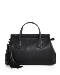 gucci black purse with tassels