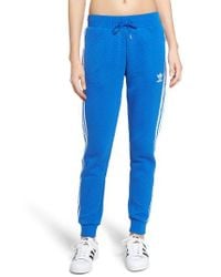 black and blue track pants