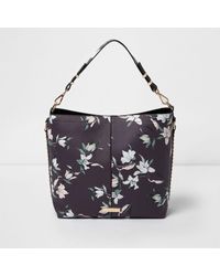 River Island Black Floral Studded Underarm Slouch Bag