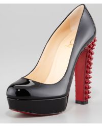 christian-louboutin-blackrouge-taclou-spikeheel-redsole-platform-pump-black-product-1-12075793-273221760.jpeg