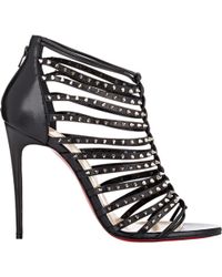 Christian louboutin Millaclou Studded Leather Cage Sandals in Gold ...