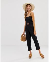 ASOS Tuta jumpsuit a grembiule con spalline e cintura - Nero