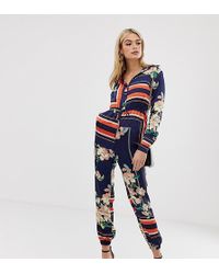 Missguided Exclusive Tall Long Sleeved Jumpsuit In Mixed Print - Blue