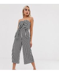 Boohoo Tuta jumpsuit a fascia con gonna pantaloni e fiocco a righe bianche e nere - Multicolore