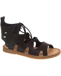 black cut out sandals