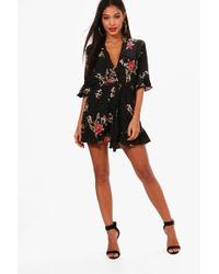 Boohoo Floral Ruffle Sleeve Wrap Over Playsuit - Black
