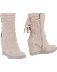guess beige boots