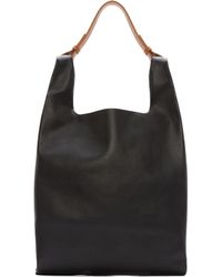 Men S Jil Sander Bags Jil Sander Black And Tan New Market Bag Lyst
