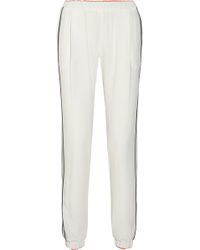 Seen on the Streets: Sporty Trousers - a lyst by Lyst Editor | Lyst