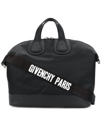 Lyst - Givenchy Navy Canvas and Leather Nightingale Foldover Flap ...