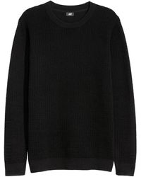 black jersey jumper