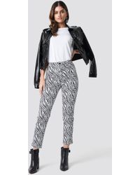 zebra denim pants