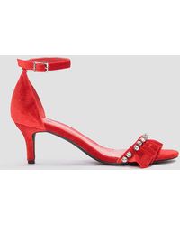 red frill heels