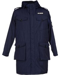 Love moschino Outerwear Hood Quilted in Blue for Men (Navy) | Lyst