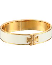 Thin Gold Bracelets Women S Designer Tory Burch Raised Logo Thin Enamel Hinged Bracelet Navy Gold
