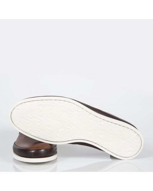 brown leather shoes with white sole