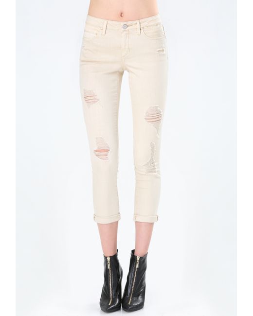 beige ripped jeans