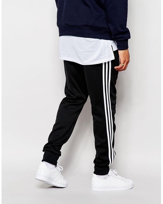 black cuffed track pants