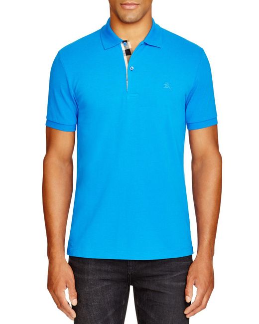 blue burberry polo