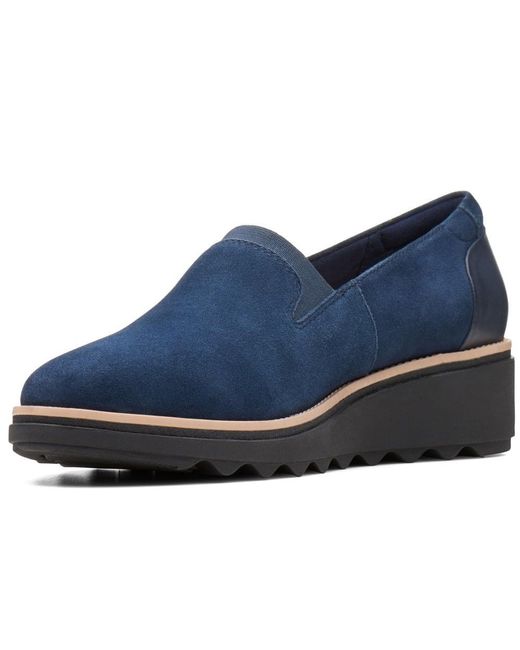 sharon dolly wedge