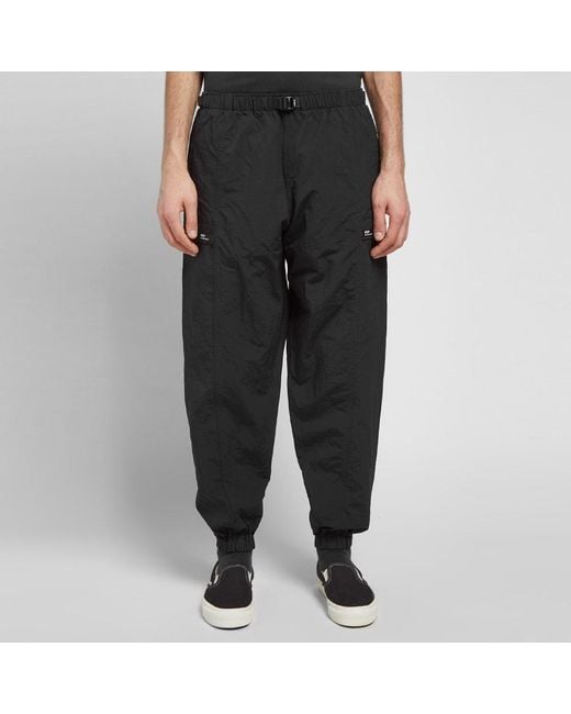 WTAPS TRACKS TROUSERS NYLON