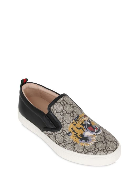 gucci tiger slip ons