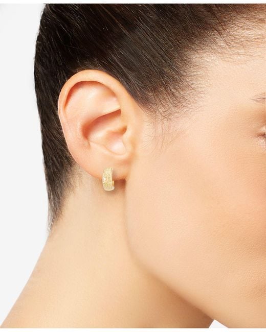 Lyst Macy S Textured Wide Huggie Hoop Earrings In Metallic Macy S Metallic Textured Wide Huggie Hoop Earrings Lyst