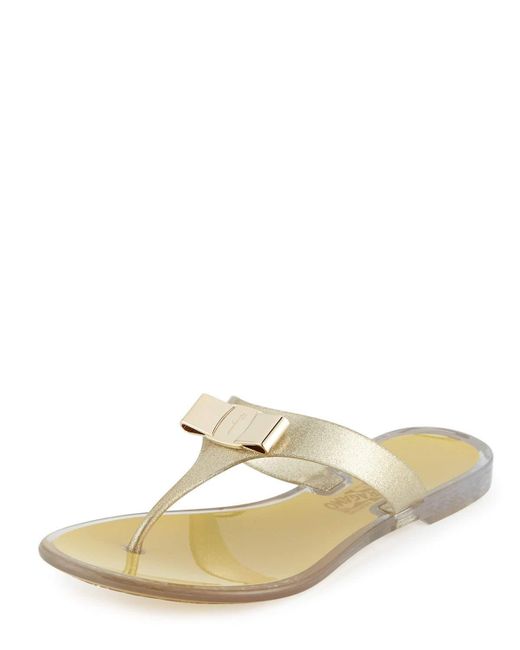  Ferragamo  Farelia Bow Flat Jelly  Thong Sandal  in Metallic 