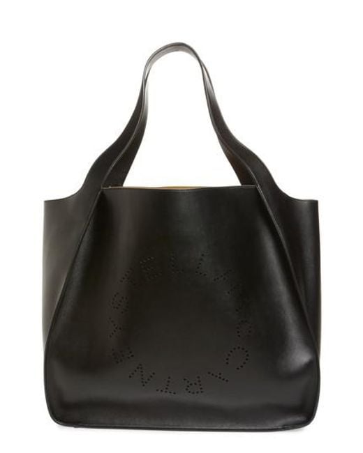 Lyst Stella Mccartney Extra Large Perforated Logo Faux Leather Stella Mccartney Black Extra Large Perforated Logo Faux Leather Tote Lyst