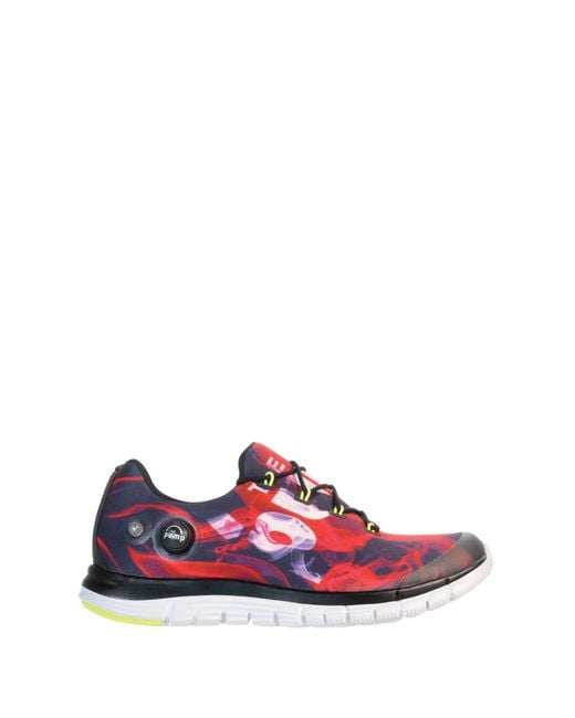 $57 - Running. Round toe with bumper. Mesh detail. Reebok brand logo detail. Lace-up vamp. Padded tongue and collar. Removable padded insole. Pump Air Cage for customizable support that fuses to your foot. Rubber bumper. Grip sole. Manmade upper and sole. Color: BLACK-RED-WHITE-YELLOW