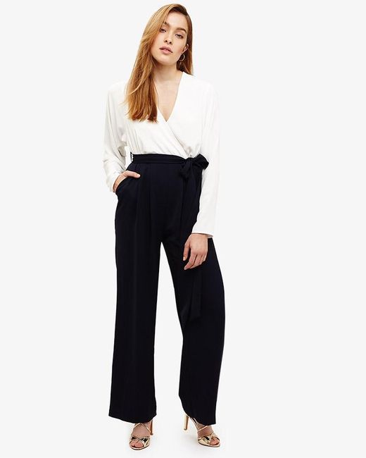 [Image: phase-eight-NavyIvory-Betina-Long-Sleeve-Jumpsuit.jpeg]