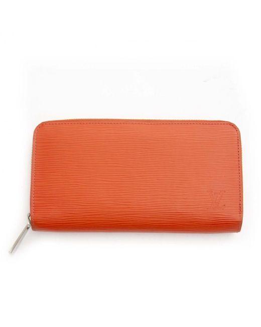 Louis Vuitton Zippy Orange Leather Wallets in Orange - Lyst