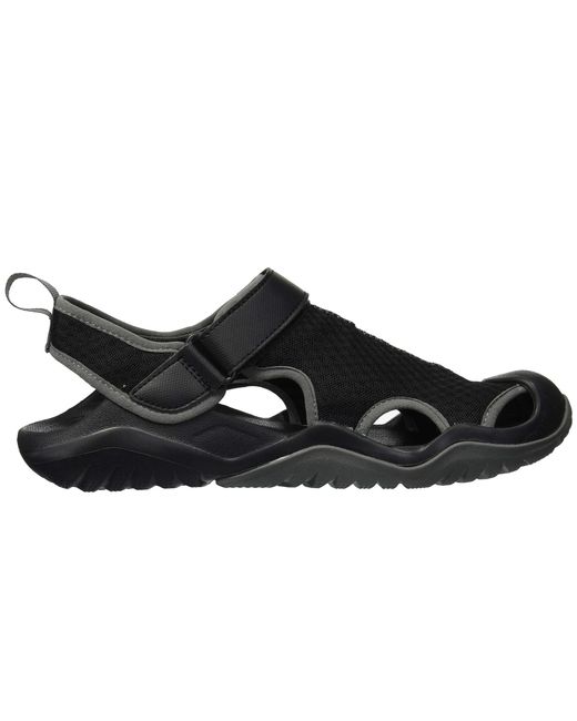 Lyst - Crocs™ Swiftwater Mesh Deck Sandal (espresso) Men's Sandals in ...