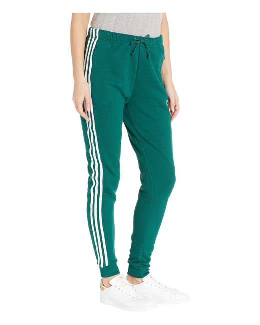 green adidas track pants women's