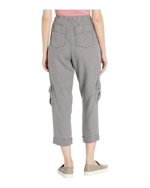 An XCVI Classic. Stretch poplin pant with rib drawstring waistband. Back and cargo pockets with 