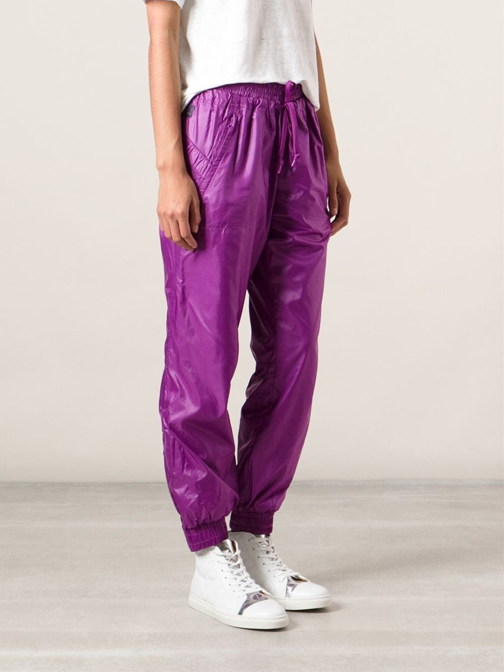 purple and black track pants