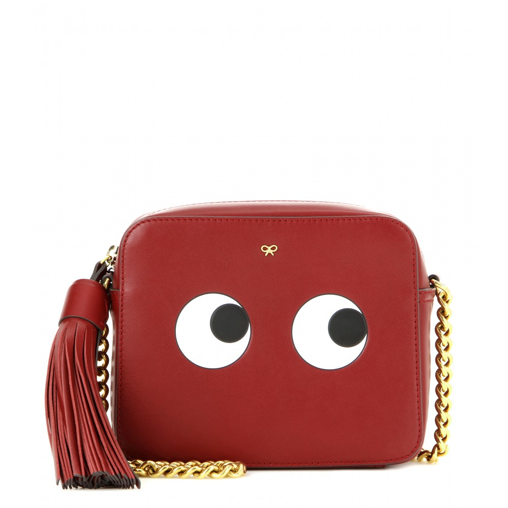 purse with eyes and red x